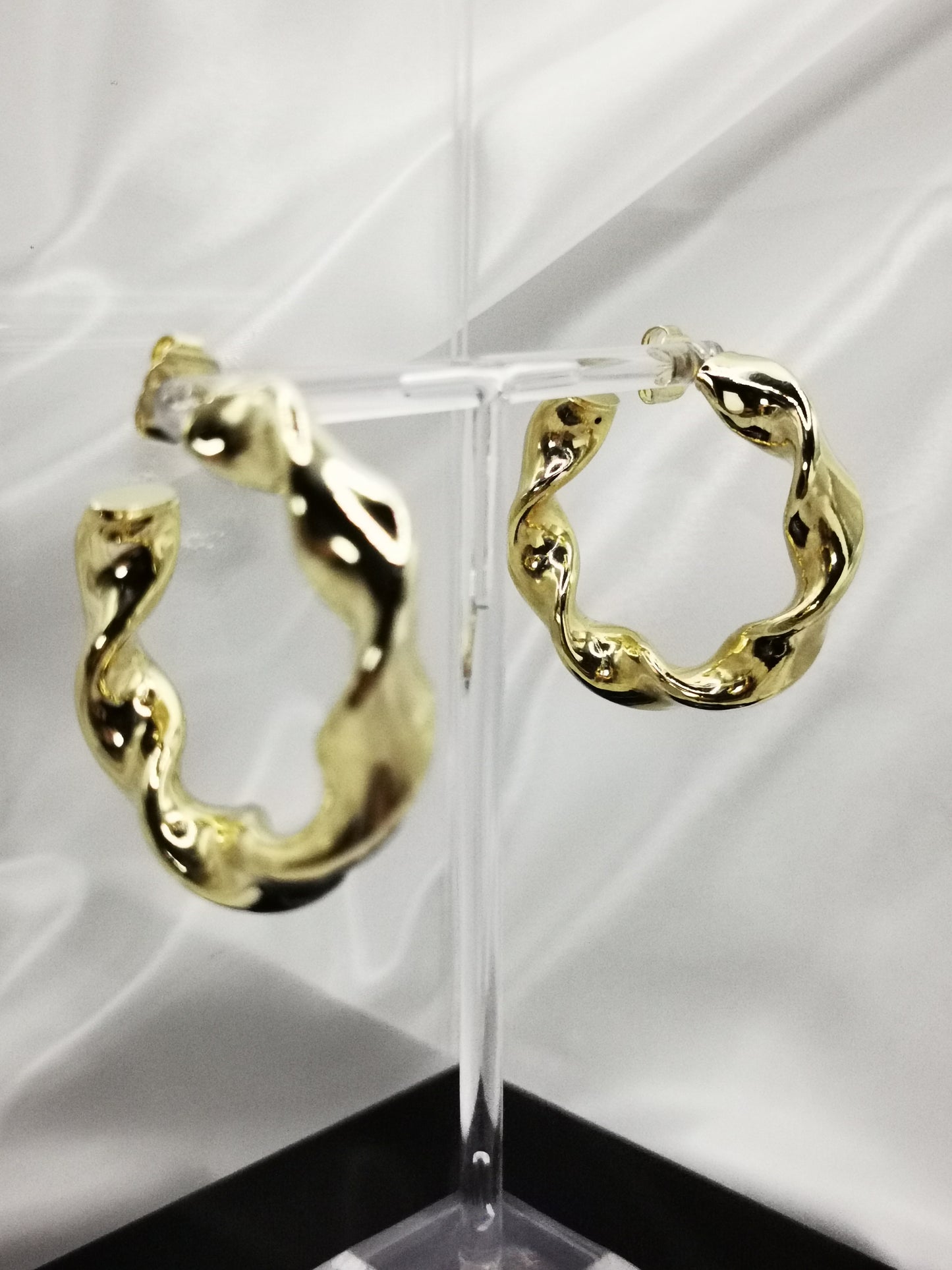Aros tirabuzón en oro