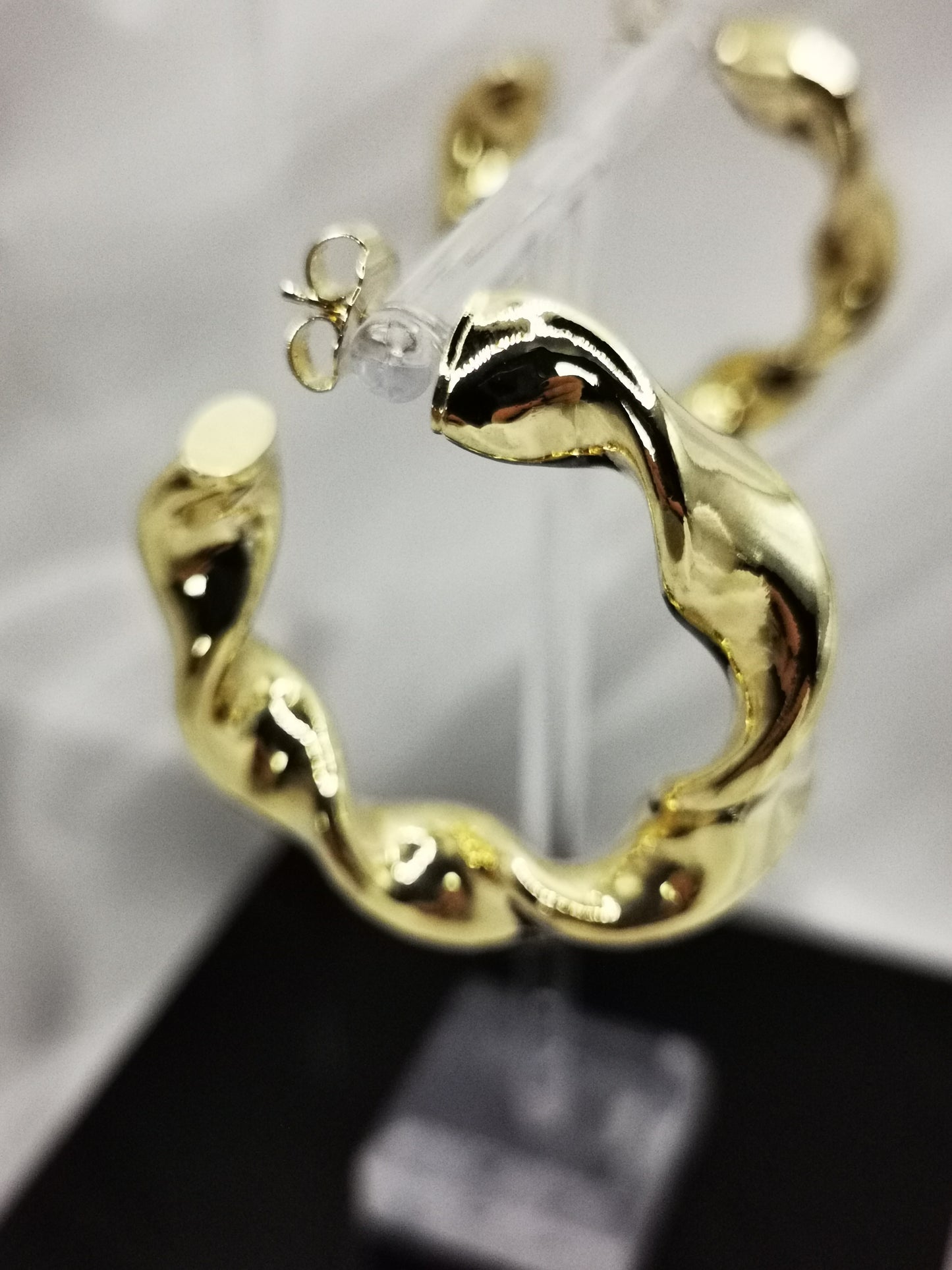 Aros tirabuzón en oro