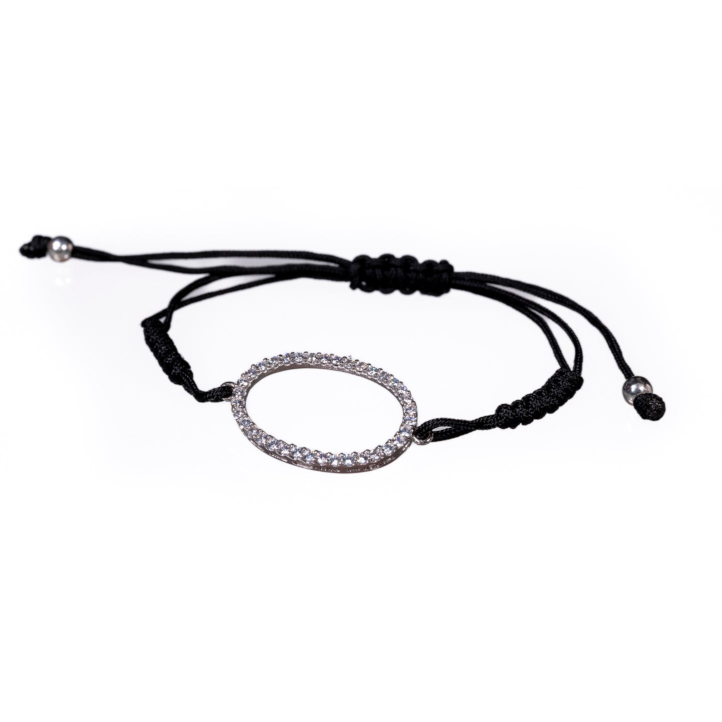 Pulsera de hilo con óvalo en plata y circonitas blancas