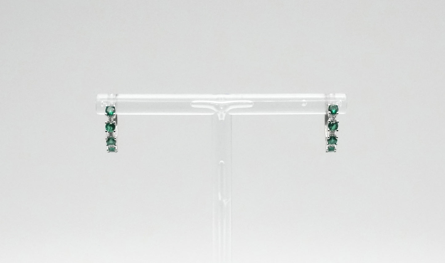 Aros de plata rodiada con circonitas intercaladas color esmeralda