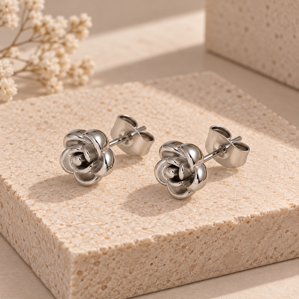 Pendientes flor en acero plata