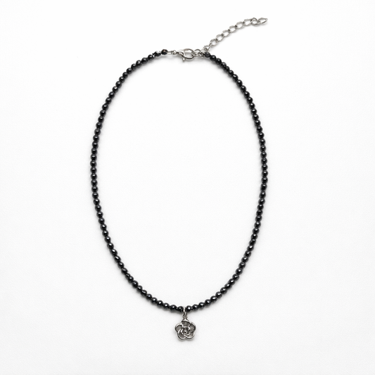 Collar flor acero y hematites facetados