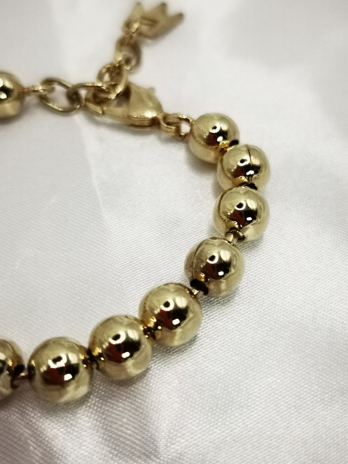 Pulsera bolas oro